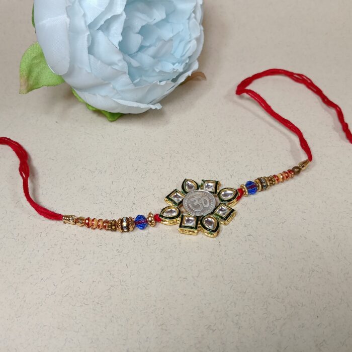 Elegant Pure Silver Om Rakhi With Kundan – Symbol of Bond & Blessings