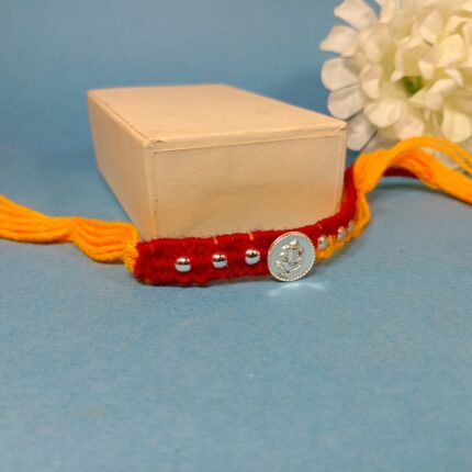Silver Ganesha With Ball Rakhi – A Thread of Love & Purity