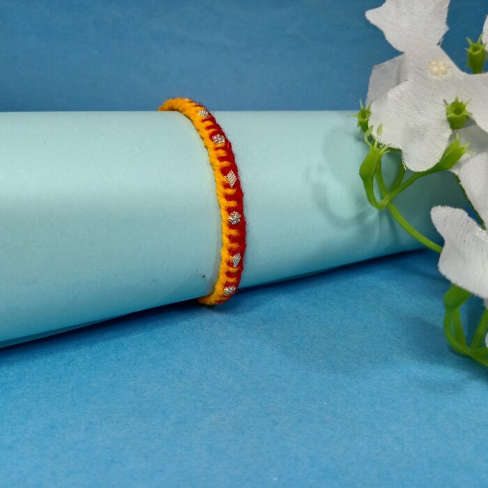 Traditional Handcrafted Moli Rakhi with Silver Polished Highlights