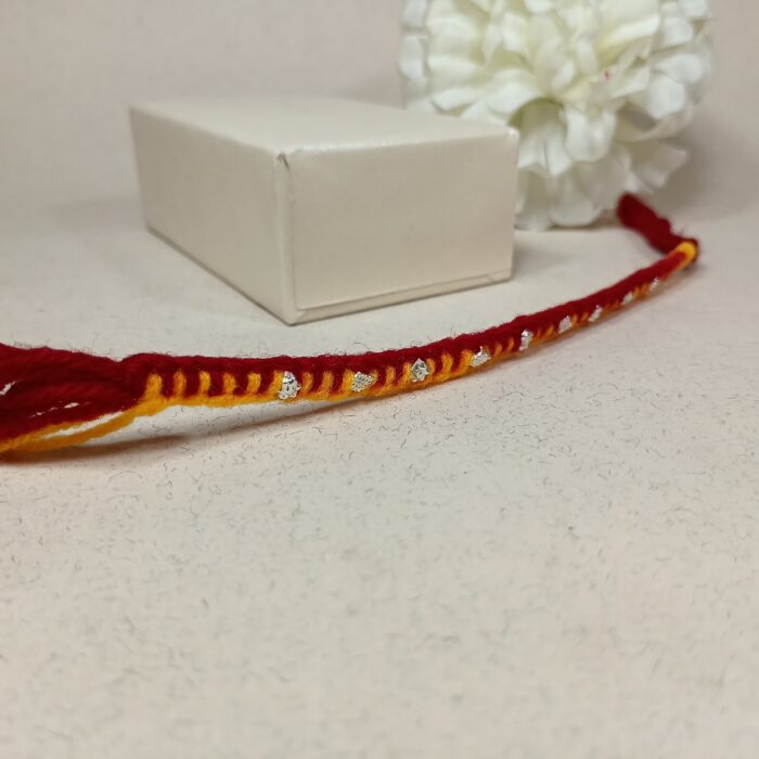 Traditional Handcrafted Moli Rakhi with Silver Polished Highlights