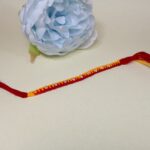 Traditional Handcrafted Moli Rakhi with Silver Polished Highlights