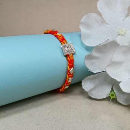 Pure Silver Ganesh Rakhi – Divine Blessings Thread