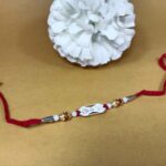 Pure Silver Om oue Sakhiya Rakhi – A Bond That Shines Forever