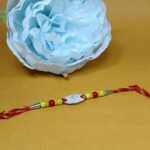 Elegant Om Silver Rakhi – A Pure Thread of Love