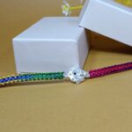 Pure Silver Kalash Rakhi with Multicolor Braided Thread