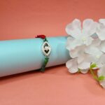 Pure Silver Krishna Dancing Rakhi – A Timeless Bond of Love