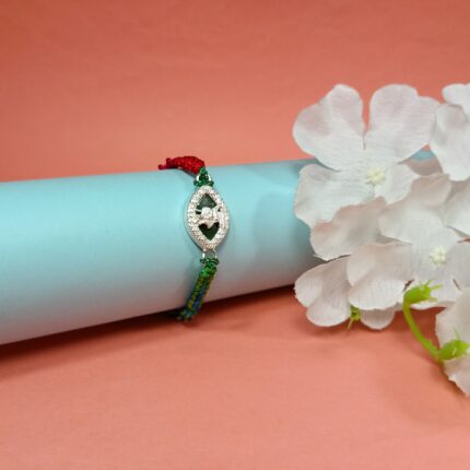 Pure Silver Krishna Dancing Rakhi – A Timeless Bond of Love