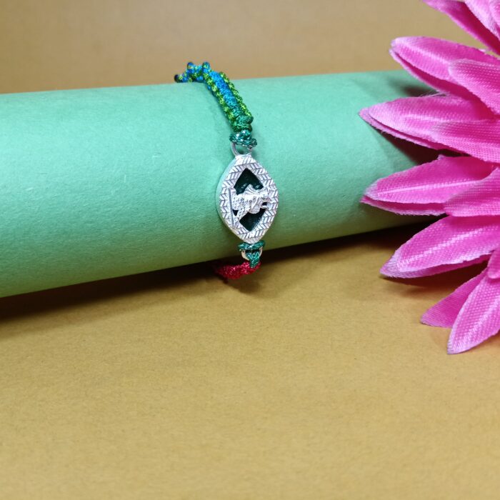 Pure Silver Krishna Dancing Rakhi – A Timeless Bond of Love