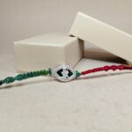 Pure Silver Krishna Dancing Rakhi – A Timeless Bond of Love