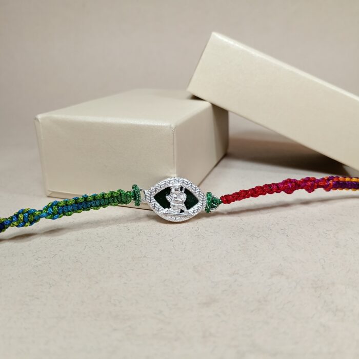 Pure Silver Krishna Dancing Rakhi – A Timeless Bond of Love