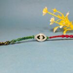 Pure Silver Krishna Dancing Rakhi – A Timeless Bond of Love