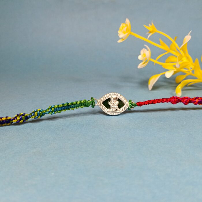 Pure Silver Krishna Dancing Rakhi – A Timeless Bond of Love