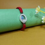 Pure Silver Krishna Rakhi with Mor Pankh – Divine Bond of Love