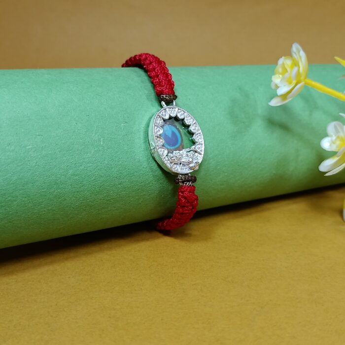 Pure Silver Krishna Rakhi with Mor Pankh – Divine Bond of Love