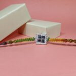 Pure Silver Swastik Rakhi with Multicolor Dhaga – Traditional Blessings in Style