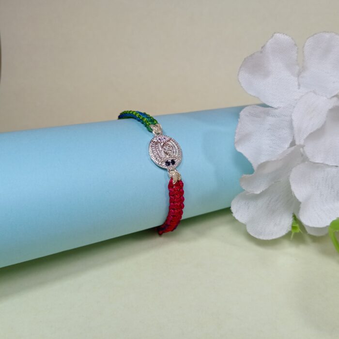 Pure Silver Flower Rakhi with Multicolor Dhaga – A Blooming Bond of Love
