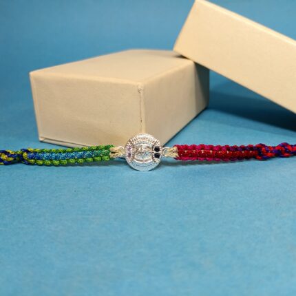 Pure Silver Flower Rakhi with Multicolor Dhaga – A Blooming Bond of Love