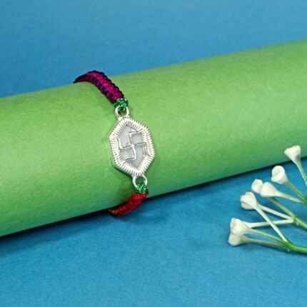 Pure Silver Hexagon Swastik Rakhi with Multicolor Dhaga – Strength, Style & Spirituality