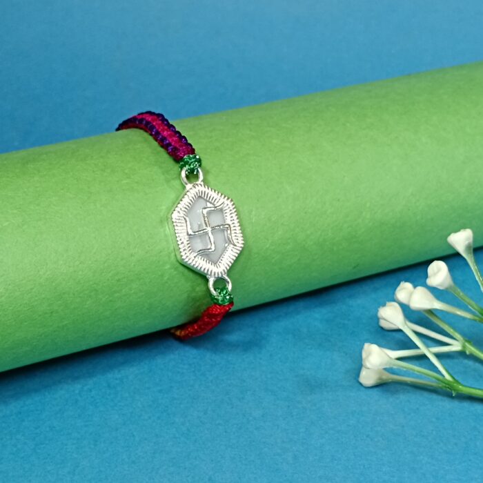 Pure Silver Hexagon Swastik Rakhi with Multicolor Dhaga – Strength, Style & Spirituality
