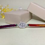 Pure Silver Hexagon Swastik Rakhi with Multicolor Dhaga – Strength, Style & Spirituality