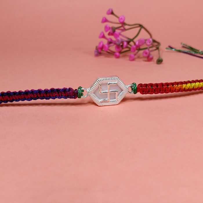 Pure Silver Hexagon Swastik Rakhi with Multicolor Dhaga – Strength, Style & Spirituality
