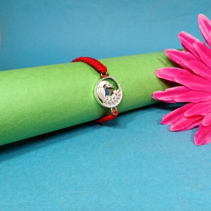 Pure Silver Peacock Rakhi with Colorful Morpankh – A Royal Thread of Love