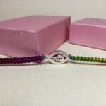 Pure Silver Radhe Rakhi with Colourful Dhaga