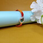 Divine Peacock Feather Rakhi