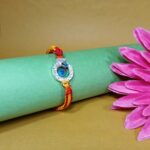 Divine Peacock Feather Rakhi