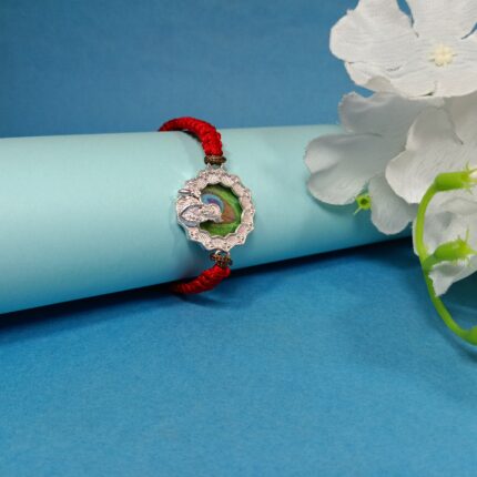 Pure Silver Krishna Rakhi with Colourful Mor Pankh Design