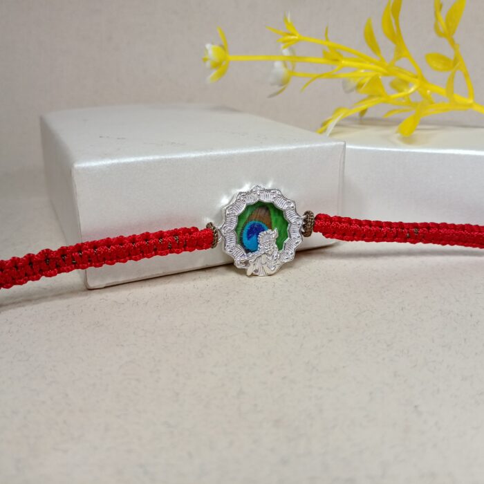 Pure Silver Krishna Rakhi with Colourful Mor Pankh Design