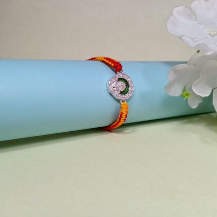 Divine Ganesha Silver Rakhi with Red & Yellow Thread
