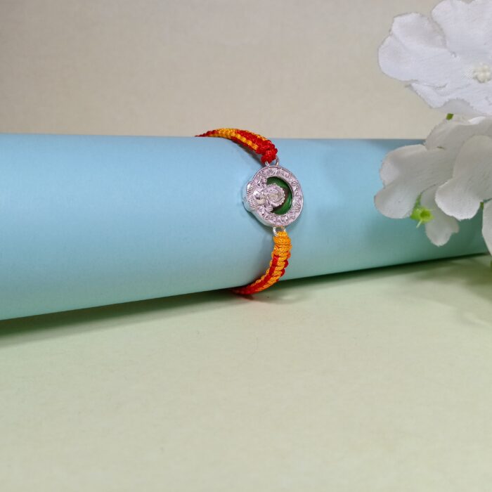 Divine Ganesha Silver Rakhi with Red & Yellow Thread