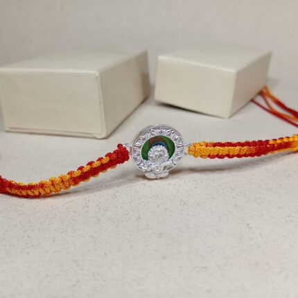 Divine Ganesha Silver Rakhi with Red & Yellow Thread