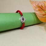 Divine Om Silver Rakhi