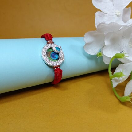 Silver Peacock Feather Rakhi with Red Thread