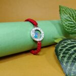Auspicious Krishna Charm Silver Rakhi