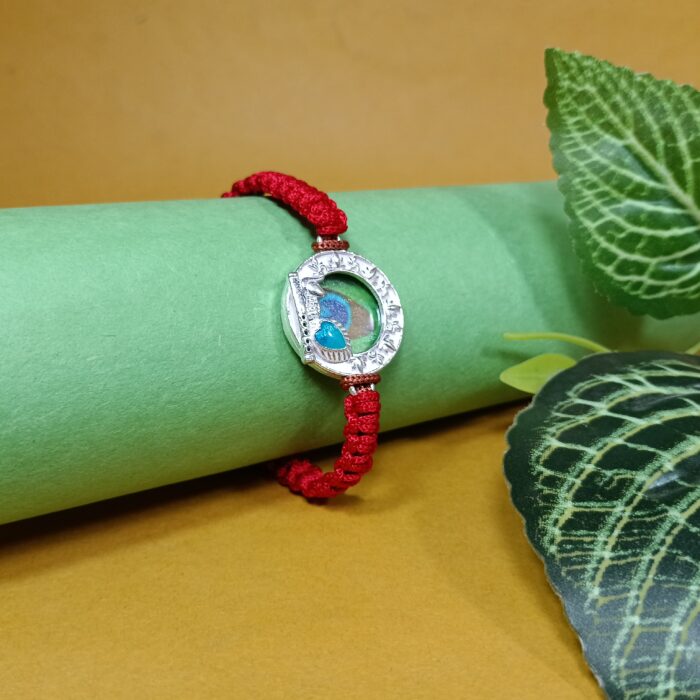 Auspicious Krishna Charm Silver Rakhi