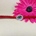 Auspicious Krishna Charm Silver Rakhi