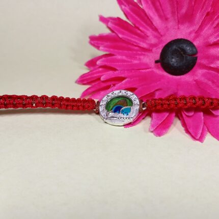 Auspicious Krishna Charm Silver Rakhi