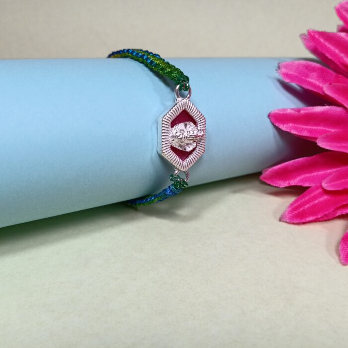 Silver Ganesha Rakhi with Green & Blue Thread