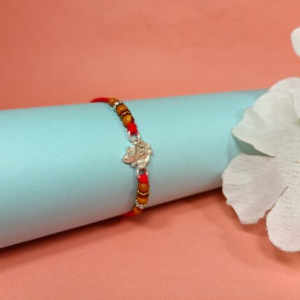 Pure Silver Ganesha Rakhi with Wooden Beads & Red Dhaga