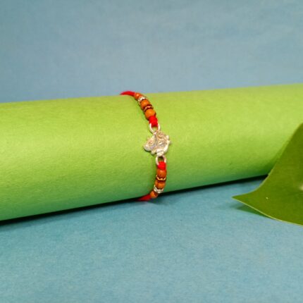 Pure Silver Ganesha Rakhi with Wooden Beads & Red Dhaga