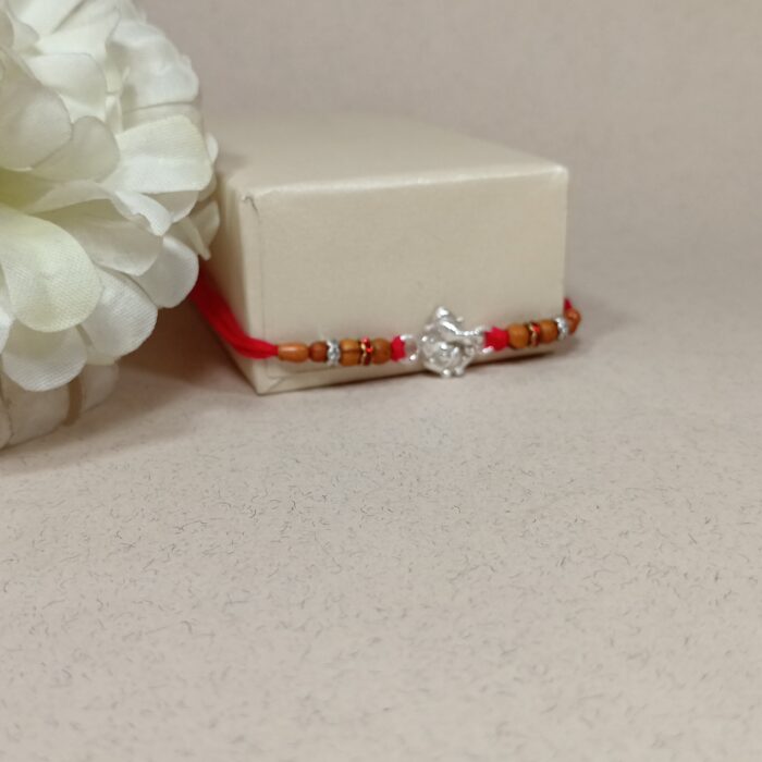 Pure Silver Ganesha Rakhi with Wooden Beads & Red Dhaga