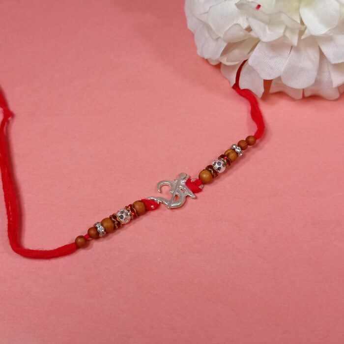 Pure Silver “Om” Rakhi with Beads & Red Thread