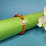 Pure Silver Lord shiv Rakhi with Sandalwood Beads & Decorative Tassels