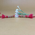 Pure Silver Lord shiv Rakhi with Sandalwood Beads & Decorative Tassels
