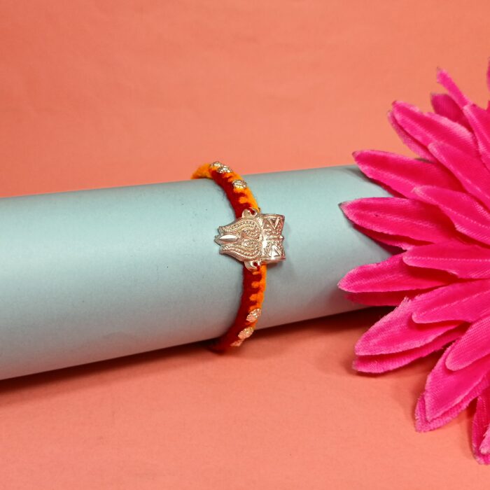 Damru Silver Rakhi – A Precious Thread of Love
