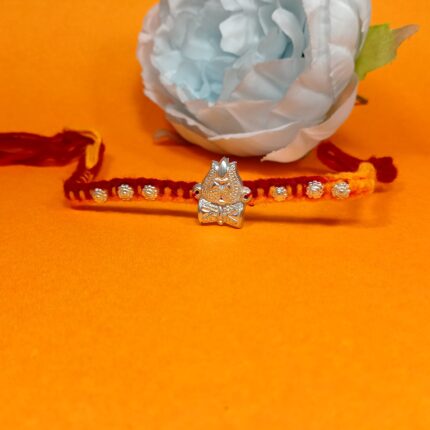 Damru Silver Rakhi – A Precious Thread of Love