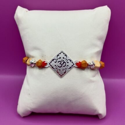 Pure Silver Om Rakhi with Beads & Red dhaga